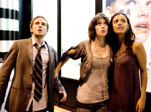 CLOVERFIELD, Michael Stahl-David, Lizzy Caplan, Jessica Lucas