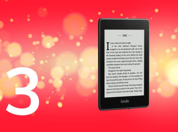 Amazon Kindle Paperwhite vor rotem Hintergrund.